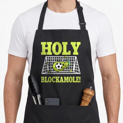 Goalie guacamole apron - Cartoon avocado goalie blocking soccer ball with Holy Blockamole text in lime green — shown on a black cotton canvas apron against a white background