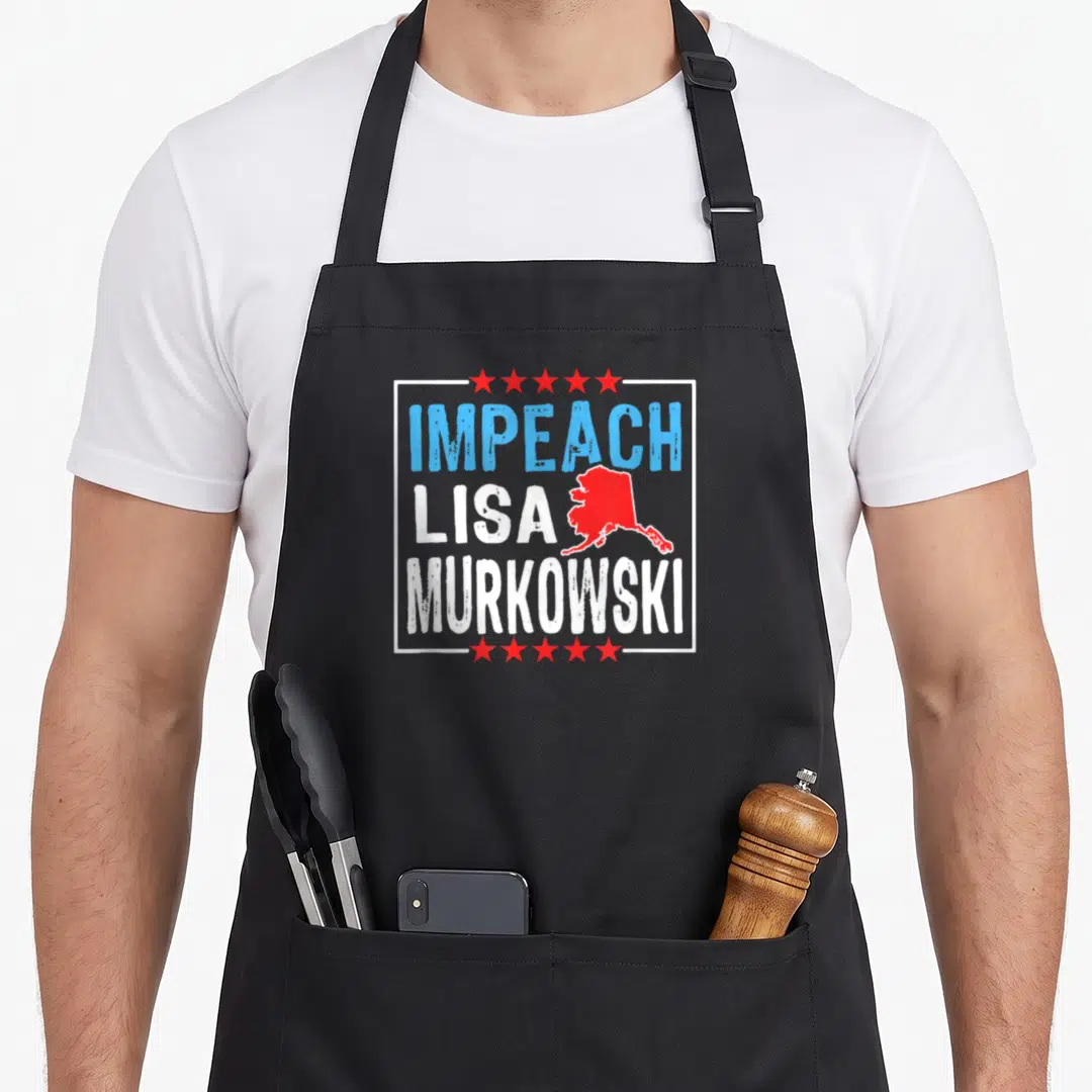 Impeach senator apron - Red Alaska map and stacked text IMPEACH LISA MURKOWSKI in distressed blue and white — shown on a black cotton canvas apron against a white background
