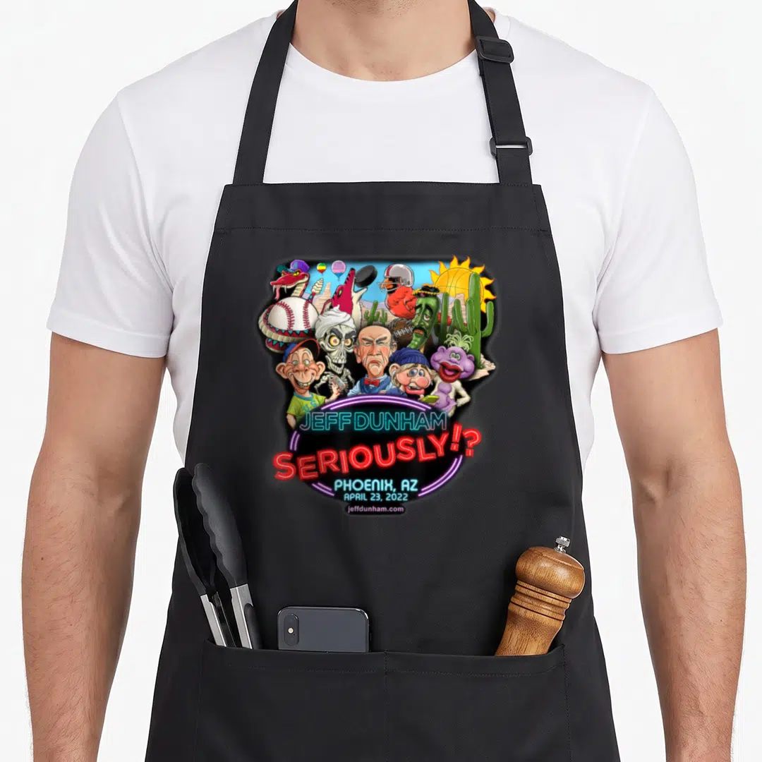 Jeff hollywood apron - Cartoon caricatures and neon text Jeff Dunham Seriously Phoenix 2022 — shown on a black cotton canvas apron against a white background