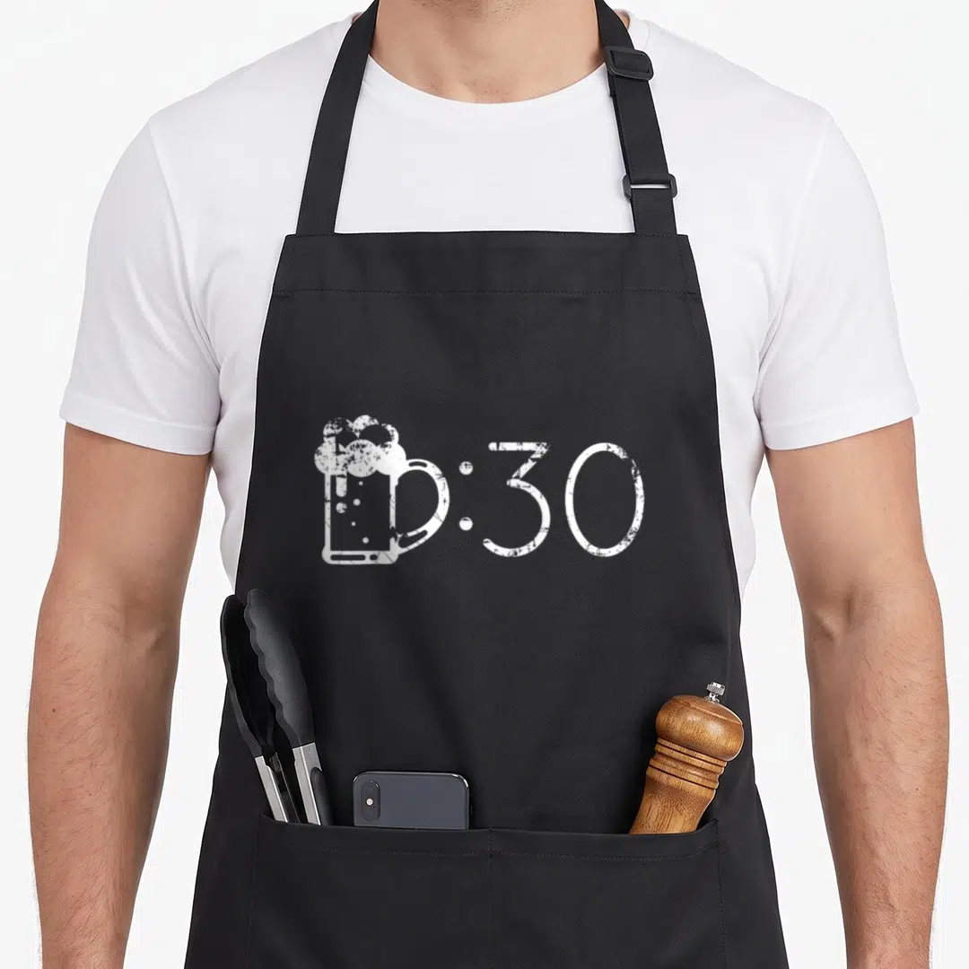 Drinker beer apron - White distressed beer mug icon next to :30 text on dark background — shown on a black cotton canvas apron against a white background