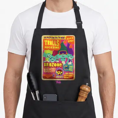 Magazine troll apron - Retro magazine cover print with cartoon trolls and text 101 PRIZES FOR YOU TO WIN BROZONE — shown on a black cotton canvas apron against a white background