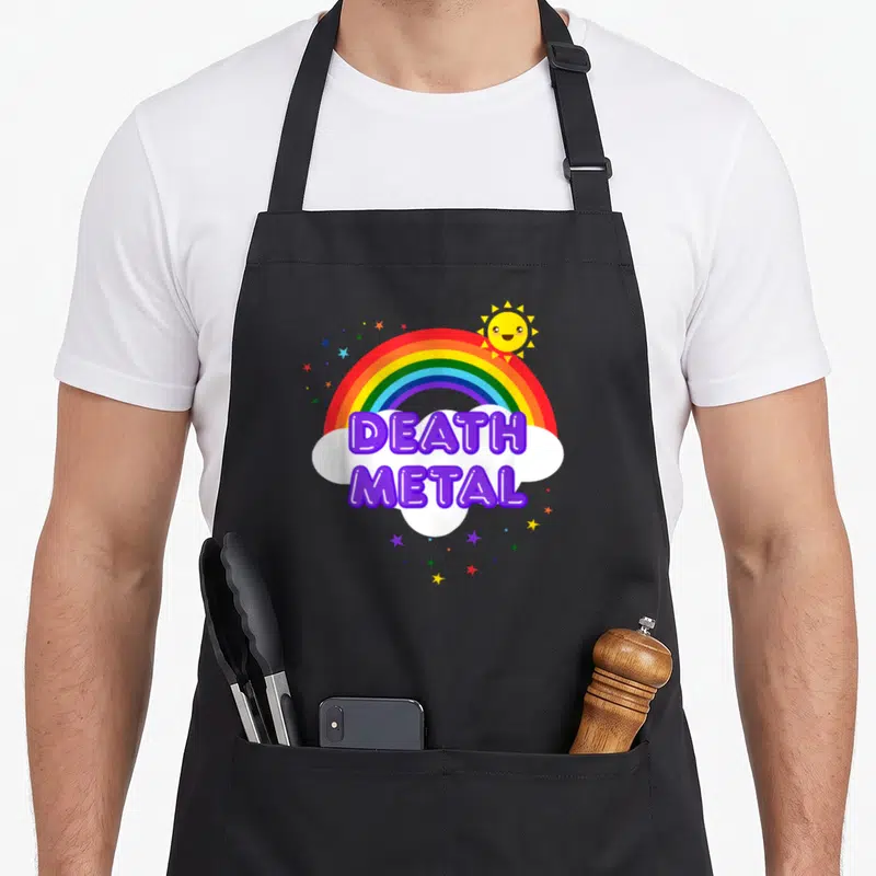 Death rainbow heavy metal apron - Purple DEATH METAL text over white cloud and rainbow with smiling sun — shown on a black cotton canvas apron against a white background