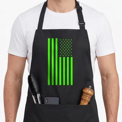 Banner novelty apron - Monochromatic lime green US flag with vertical stripes and stars on grey background — shown on a black cotton canvas apron against a white background