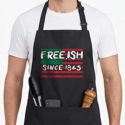 Freeish african apron - Distressed red green and white flag with free ish since 1865 text overlay — shown on a black cotton canvas apron against a white background