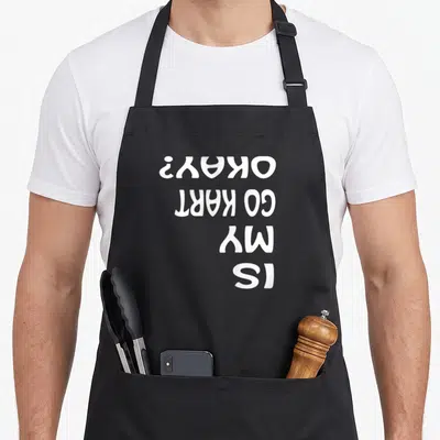 Kart karting apron - Inverted white text IS MY GO KART OKAY? on black fabric — shown on a black cotton canvas apron against a white background