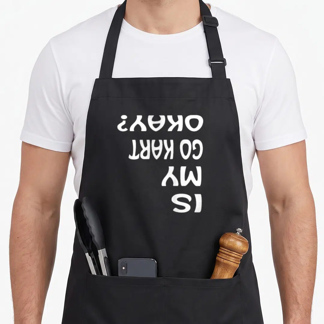Kart karting apron - Inverted white text IS MY GO KART OKAY? on black fabric — shown on a black cotton canvas apron against a white background
