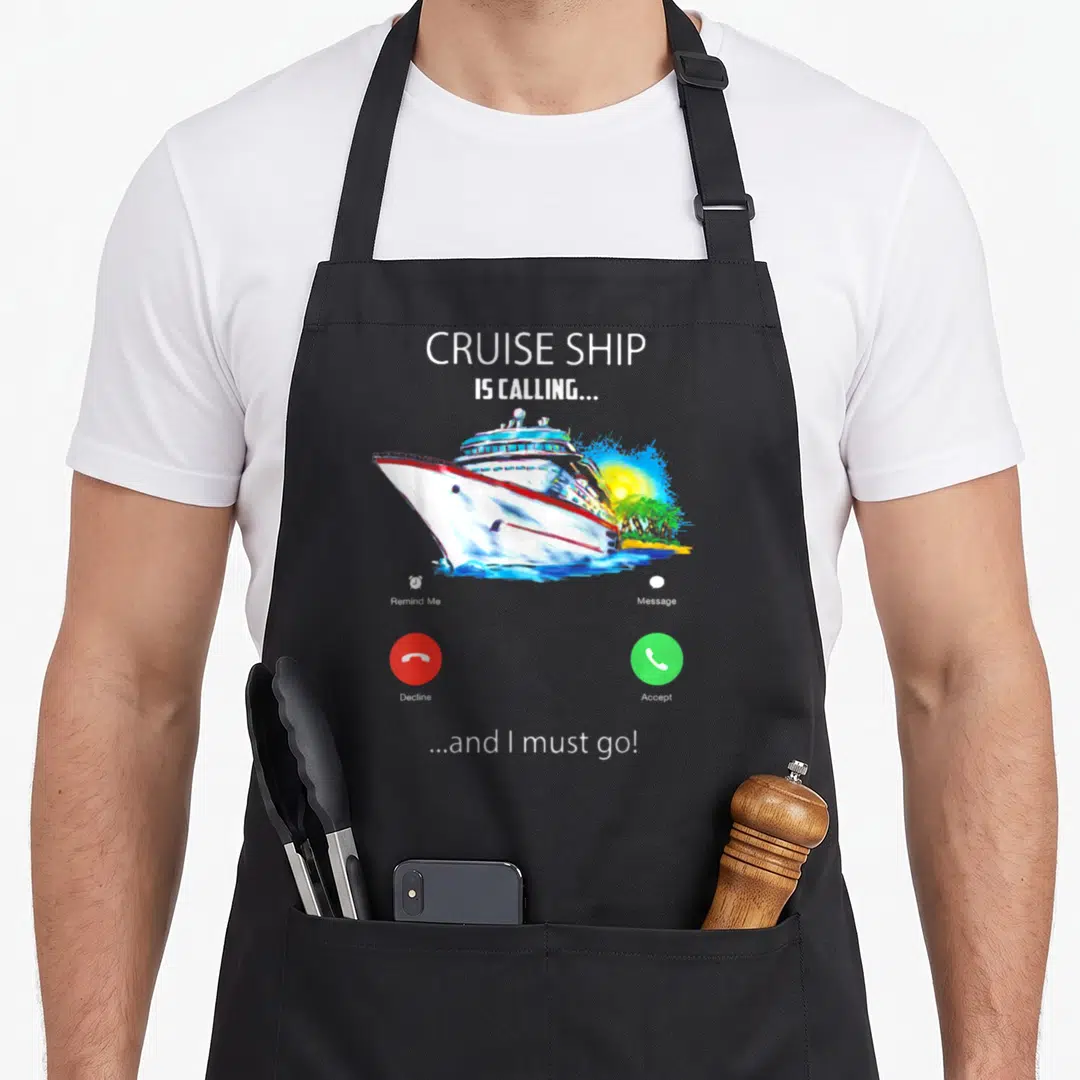 Cruise must apron - Smartphone call screen graphic with cruise ship and accept decline buttons in red green and white — shown on a black cotton canvas apron against a white background
