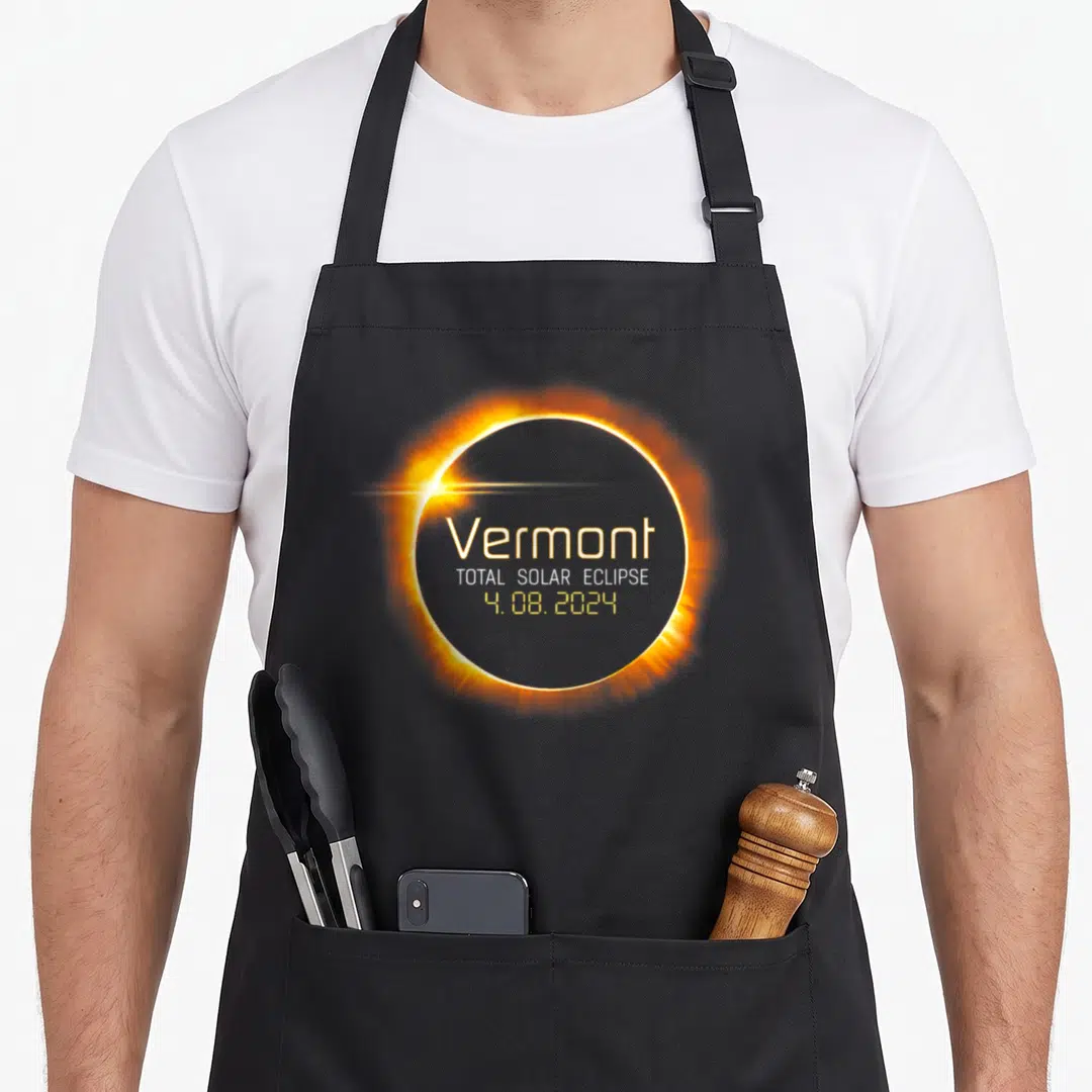 Totality vermont apron - Vermont Total Solar Eclipse 4.08.2024 glowing ring design — shown on a black cotton canvas apron against a white background