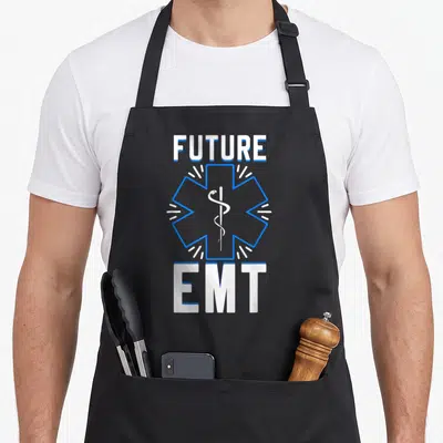 Emt future technician apron - FUTURE EMT text above and below a blue Star of Life containing a snake and staff in white — shown on a black cotton canvas apron against a white background