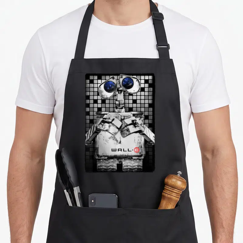 Distressed e.a apron - WALL·E robot photo art on checkered grid with name on chest in black white grey and red — shown on a black cotton canvas apron against a white background