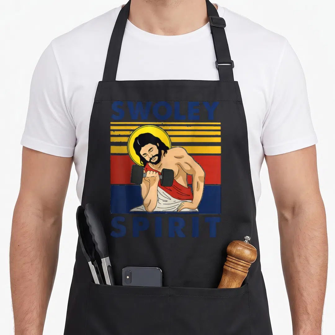 Funny weightlifting apron - Retro graphic of figure lifting dumbbell with SWOLEY SPIRIT text on striped background — shown on a black cotton canvas apron against a white background