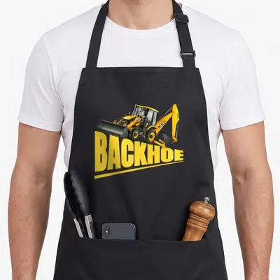 Backhoe heavy apron - Yellow backhoe loader graphic sitting atop large yellow BACKHOE text on black fabric — shown on a black cotton canvas apron against a white background