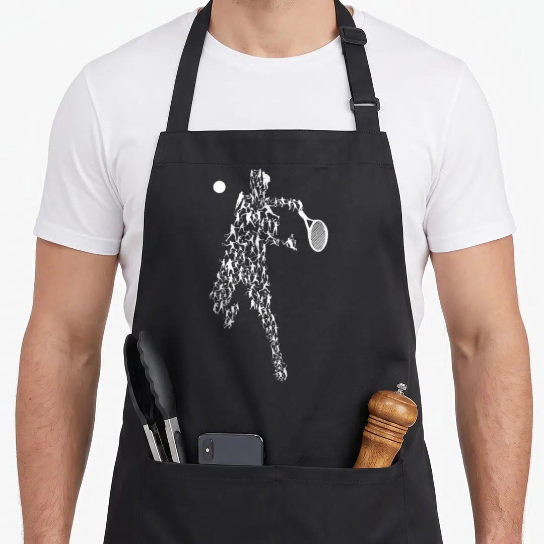 Tennis game aprons - White silhouette of tennis player formed by smaller figures, ball to left, minimalist style — shown on a black cotton canvas apron against a white background