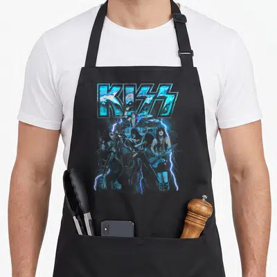 Blue band apron - KISS logo and band members with lightning bolts in blue and grey — shown on a black cotton canvas apron against a white background