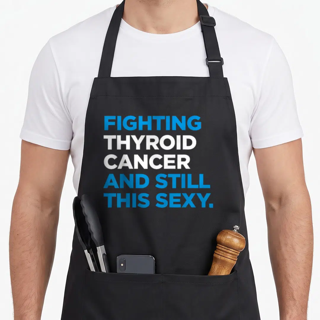Cancer awareness thyroid apron - Blue and white stacked text reading Fighting Thyroid Cancer And Still This Sexy — shown on a black cotton canvas apron against a white background