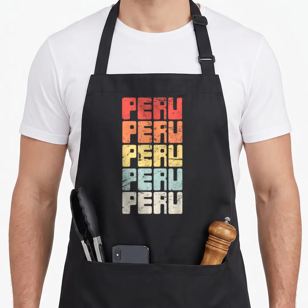 Peru vacation pride apron - Stacked distressed PERU text in red orange yellow light blue and off-white block letters — shown on a black cotton canvas apron against a white background