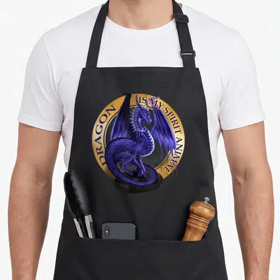Animal dragon apron - Realistic purple dragon standing on black rock within gold circle containing printed text — shown on a black cotton canvas apron against a white background