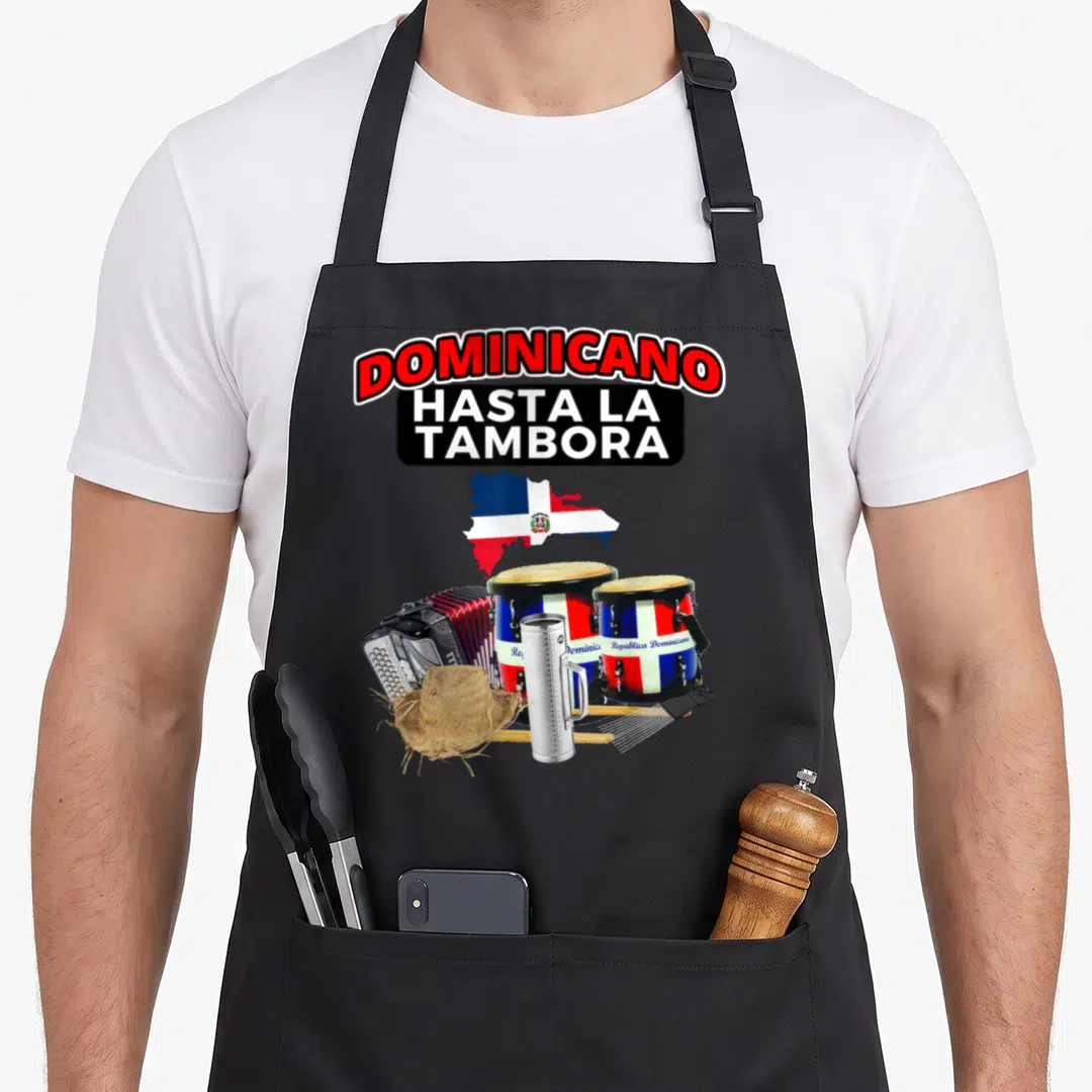 Dominicano bacanora apron - Stacked text above Dominican Republic flag map and musical instruments including drums — shown on a black cotton canvas apron against a white background