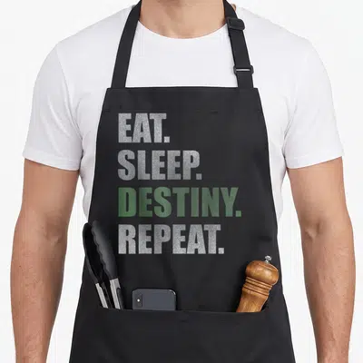 Destiny game over thirty apron - Stacked eat sleep destiny repeat text in silver and green typography — shown on a black cotton canvas apron against a white background