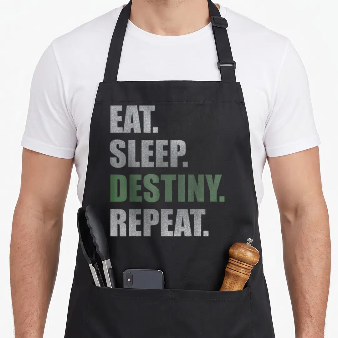 Destiny game over thirty apron - Stacked eat sleep destiny repeat text in silver and green typography — shown on a black cotton canvas apron against a white background