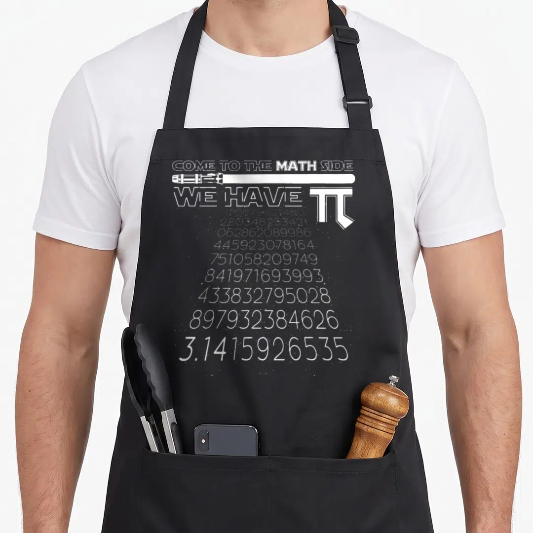 Mathematic geek aprons - White distressed text reading Come to the Math Side We Have Pi with lightsaber and number — shown on a black cotton canvas apron against a white background