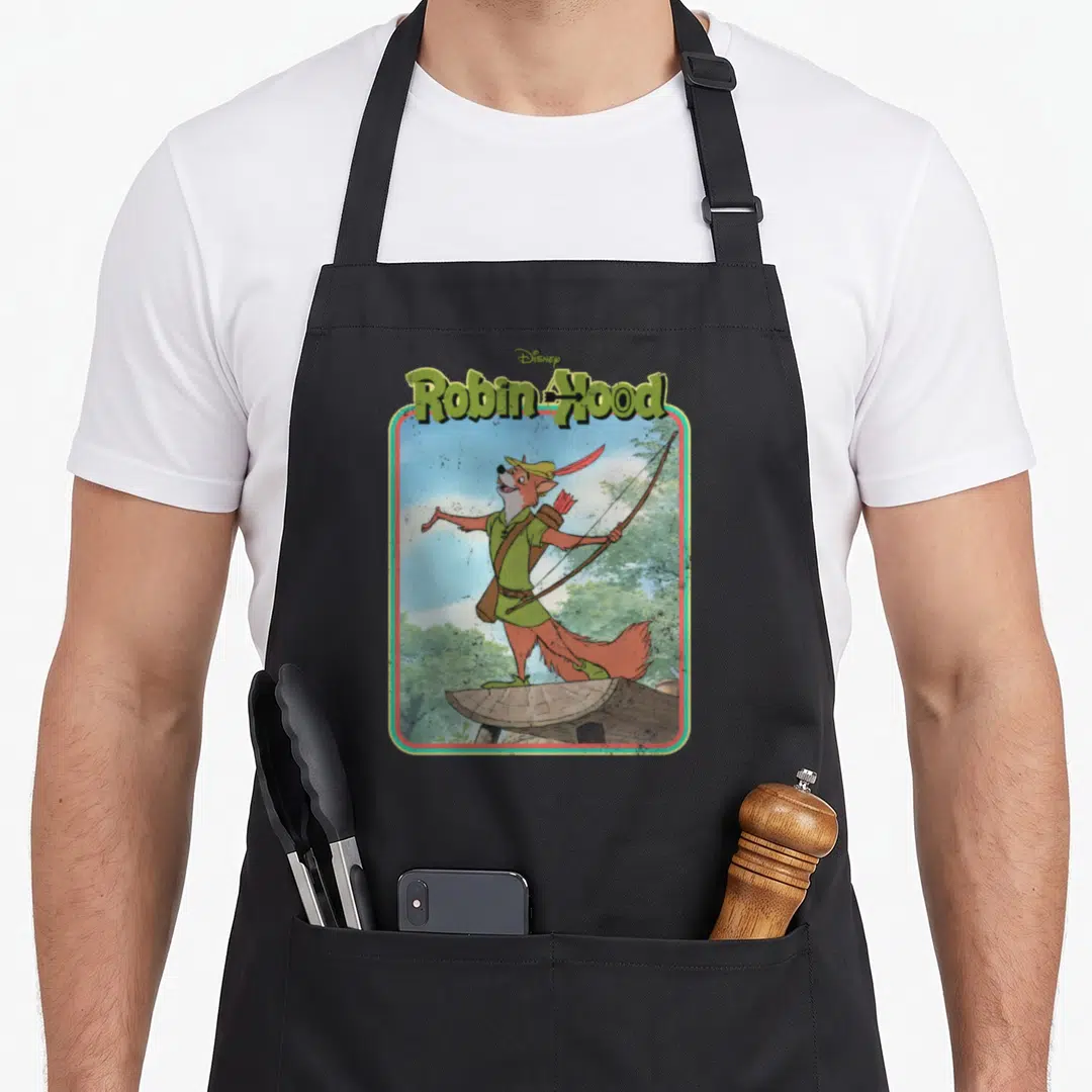 Hood robin man apron - Cartoon fox in green tunic holding bow under Robin Hood text in rounded frame — shown on a black cotton canvas apron against a white background