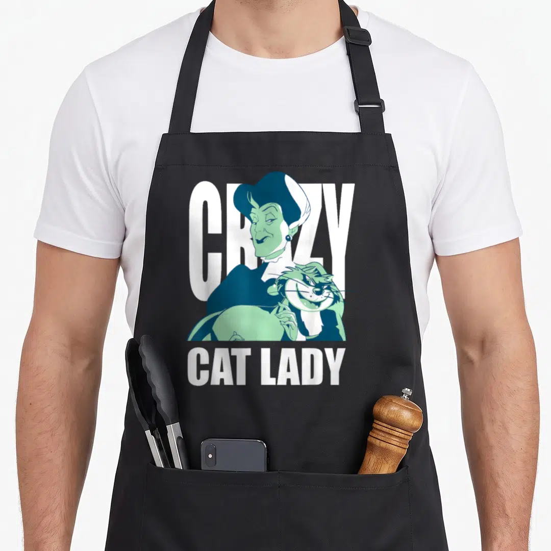 Cinderella crazy cat lady apron - Cartoon woman holding a cat with CRAZY CAT LADY text in teal and white — shown on a black cotton canvas apron against a white background