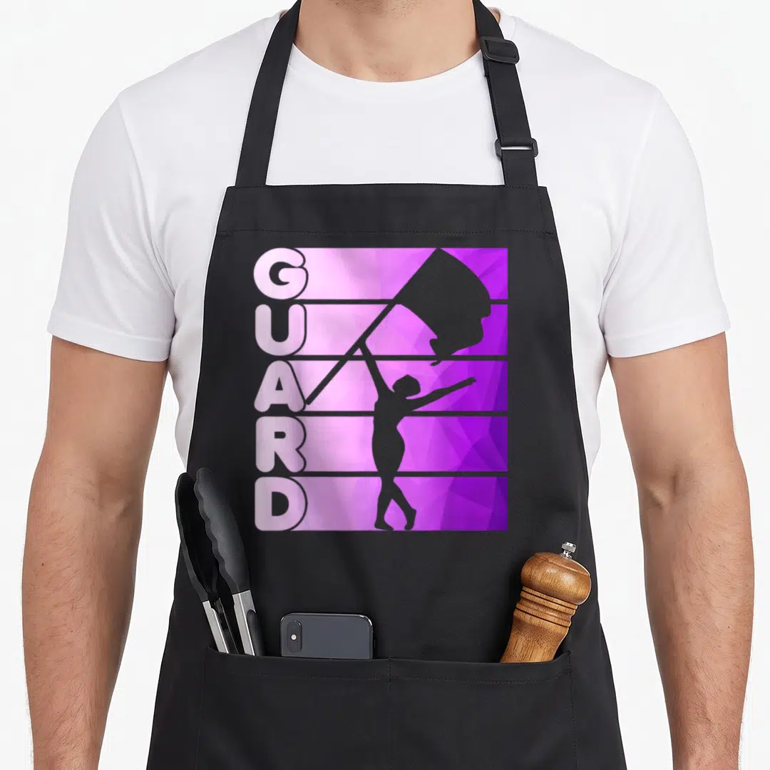 Marching point guard apron - Vertical GUARD text beside a purple color guard silhouette holding a flag on a geometric — shown on a black cotton canvas apron against a white background