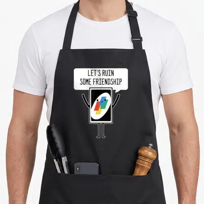 Ruin game aprons - Cartoon playing card character with arms and legs above which is a white speech bubble reading LET'S — shown on a black cotton canvas apron against a white background