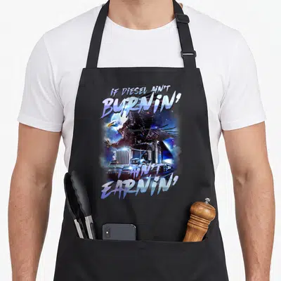 Driver rig trailer semi truck apron - Bald eagle perched on semi-truck with IF DIESEL AIN'T BURNIN text — shown on a black cotton canvas apron against a white background
