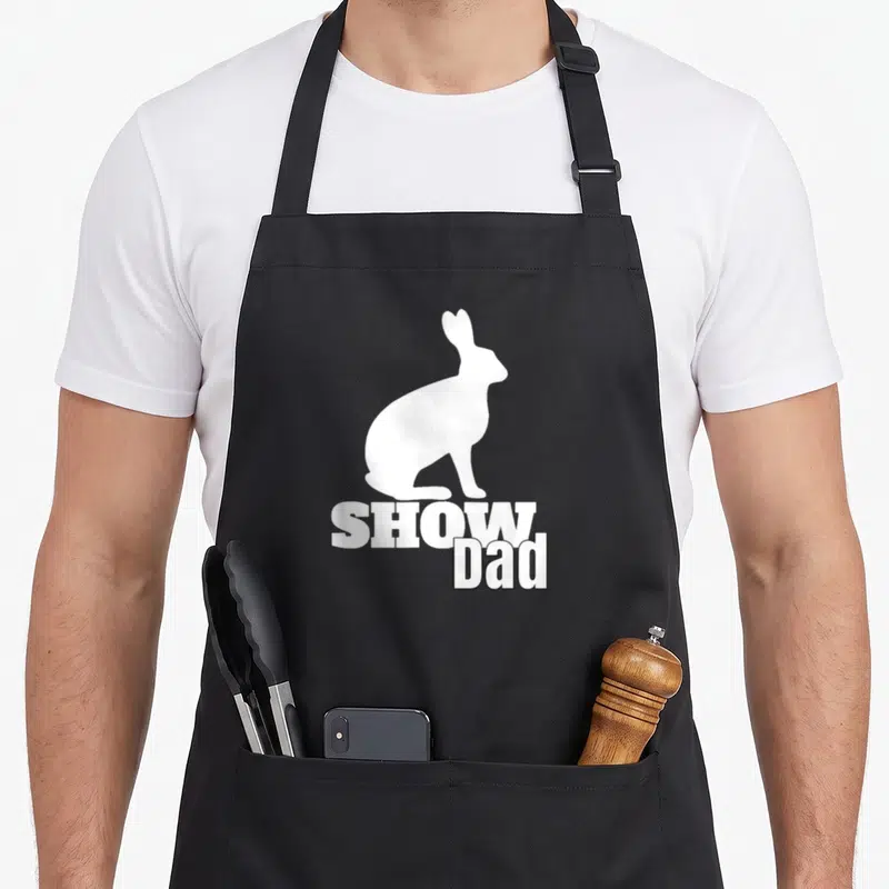 County rabbit show aprons - White rabbit silhouette above SHOW Dad text on canvas apron — shown on a black cotton canvas apron against a white background