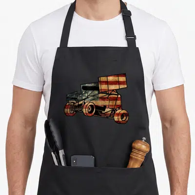 Car track apron - Sprint car graphic filled with distressed American flag pattern on black bib apron — shown on a black cotton canvas apron against a white background