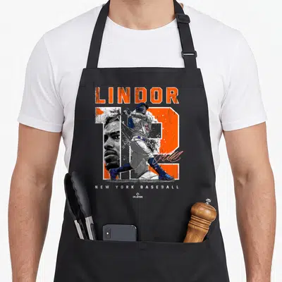 Portrait new york apron - Lindor 12 baseball player photo collage in orange blue grey white text — shown on a black cotton canvas apron against a white background