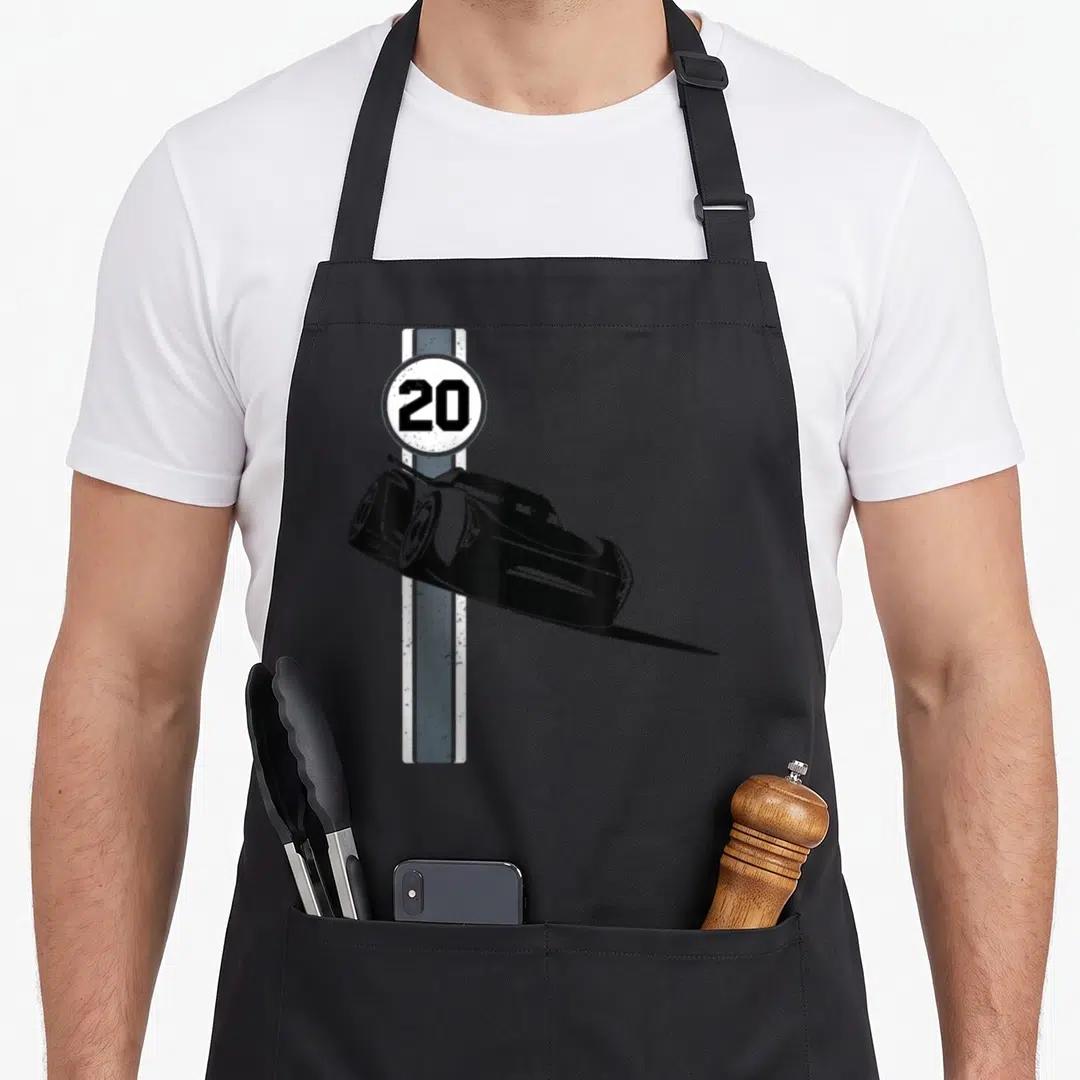 Jackson car apron - Black race car and number 20 on vertical stripe with two pockets — shown on a black cotton canvas apron against a white background