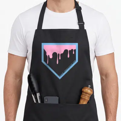 Plate drip apron - Pink dripping liquid inside light blue home plate shield outline — shown on a black cotton canvas apron against a white background