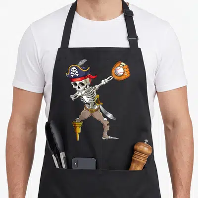 Dab skeleton apron - Cartoon skeleton pirate dabbing with baseball glove and gold peg leg — shown on a black cotton canvas apron against a white background