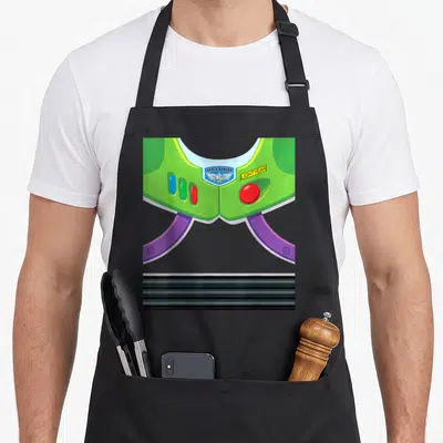 Costume camping halloween apron - Green space suit chest piece with space ranger badge and lightyear text — shown on a black cotton canvas apron against a white background