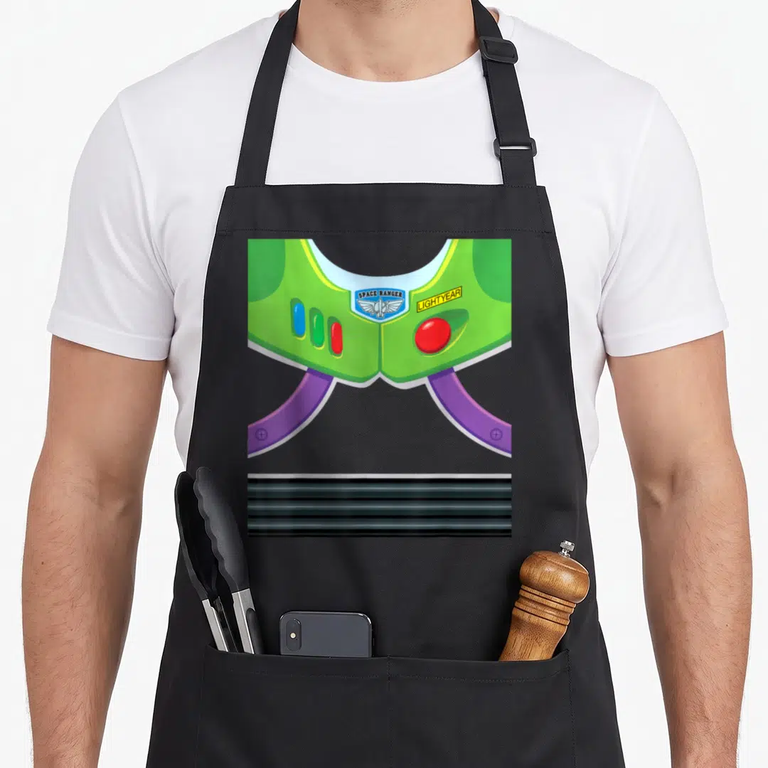 Costume camping halloween apron - Green space suit chest piece with space ranger badge and lightyear text — shown on a black cotton canvas apron against a white background
