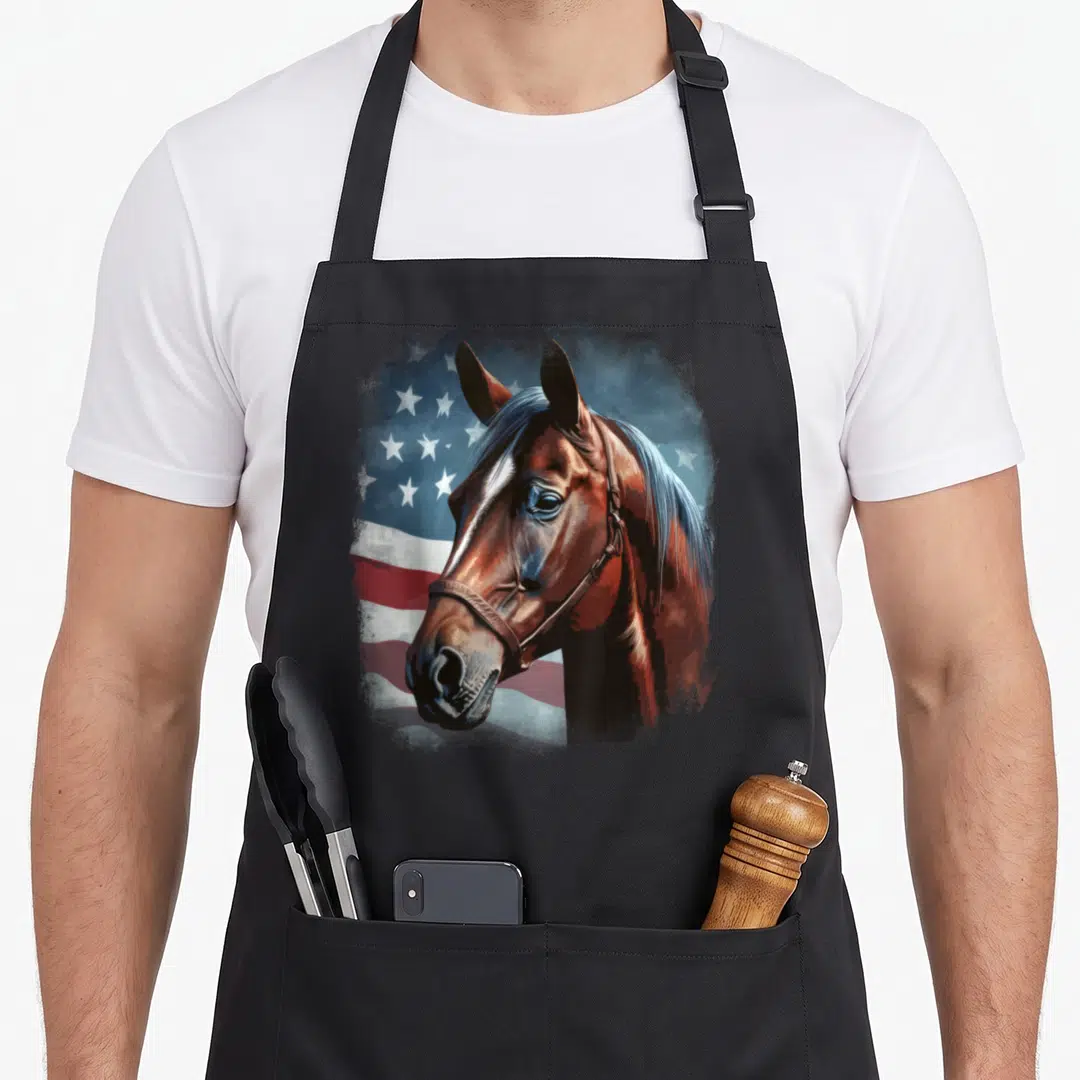 Horseback american flag apron - Realistic brown horse head overlapping a stylized red white and blue American flag — shown on a black cotton canvas apron against a white background