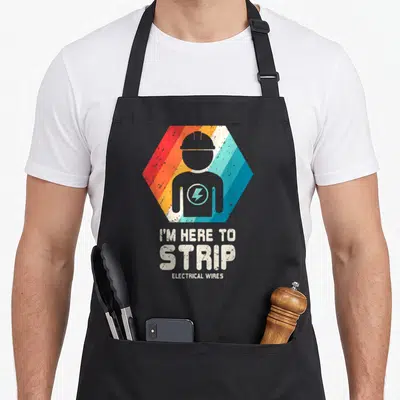 Husband electricians apron - Grey electrician silhouette in red orange blue striped hexagon with text I M HERE TO STRIP — shown on a black cotton canvas apron against a white background