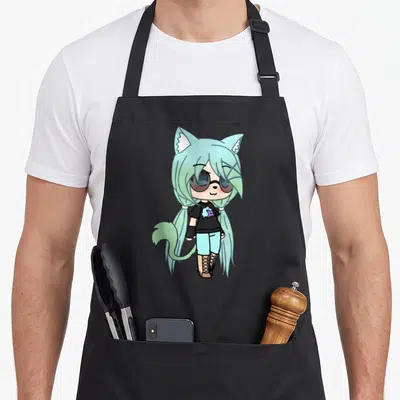 Chloe kawaii cooking apron - Chibi anime girl with mint hair, cat ears, black shirt, blue shorts, and tan boots — shown on a black cotton canvas apron against a white background