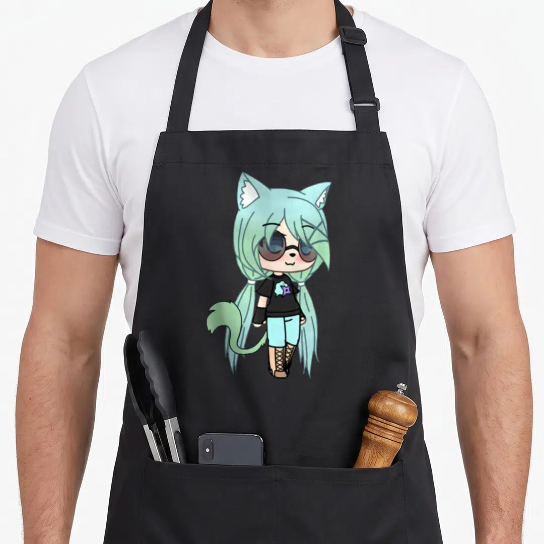 Chloe kawaii cooking apron - Chibi anime girl with mint hair, cat ears, black shirt, blue shorts, and tan boots — shown on a black cotton canvas apron against a white background