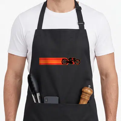 Tron race apron - Minimalist motorcyclist silhouette with horizontal red and orange speed streaks extending left — shown on a black cotton canvas apron against a white background