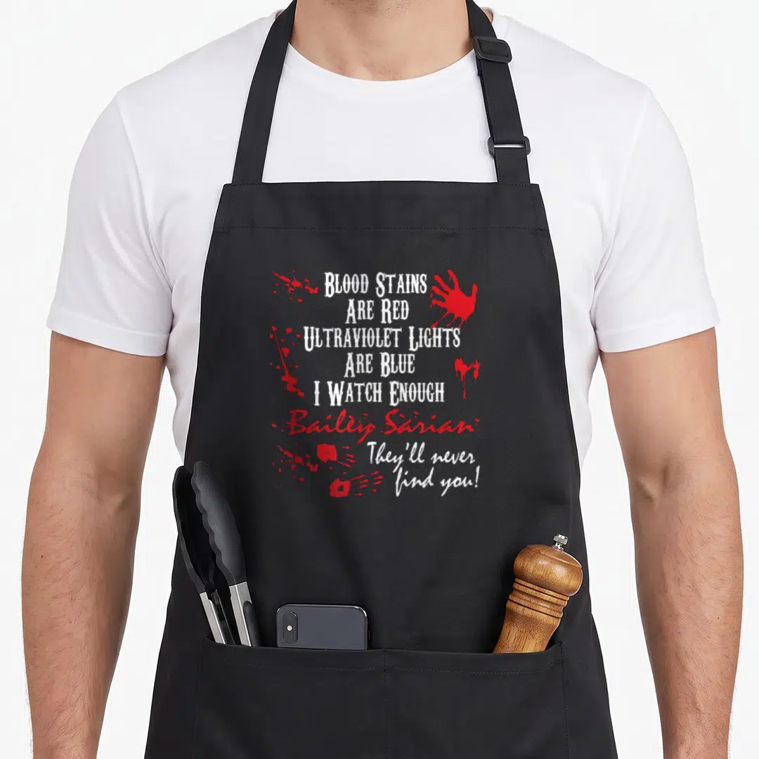 Murder blood apron - Red handprint and splatters surrounding white stacked text about forensic science on a dark — shown on a black cotton canvas apron against a white background