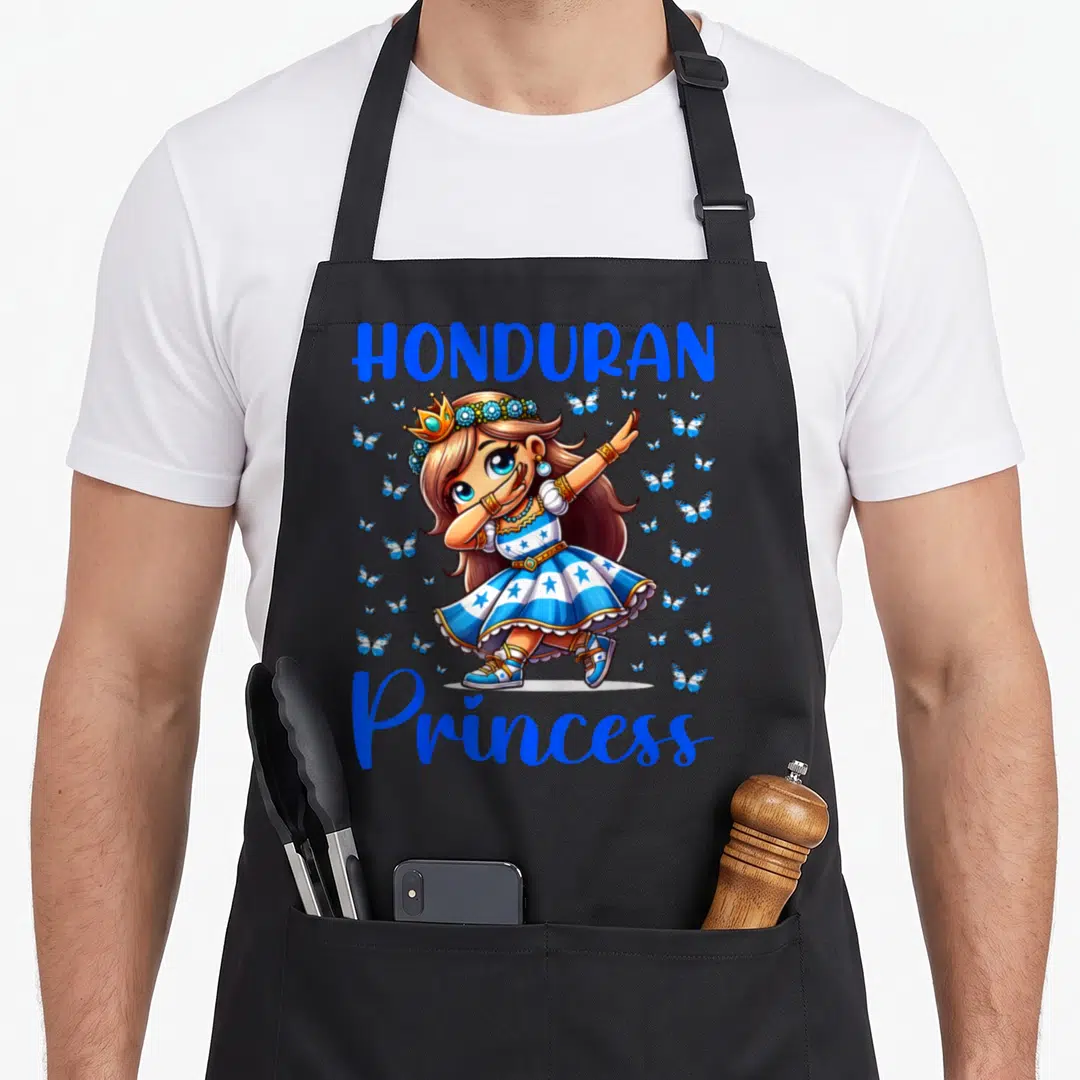 Honduran princess apron - Cartoon girl dabbing in blue and white dress with scattered blue butterflies — shown on a black cotton canvas apron against a white background