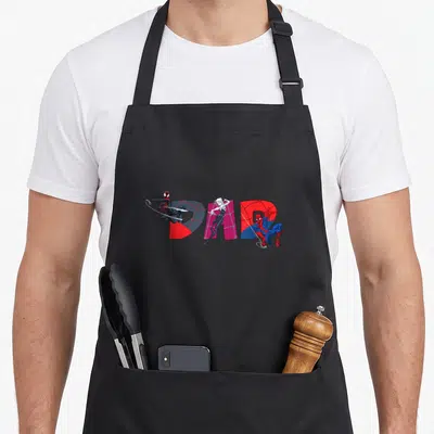 Trio father day apron - Three Spider-people pose around red SPAR letters with web pattern fill in cartoon style — shown on a black cotton canvas apron against a white background