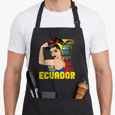 Chica ecuador apron - Cartoon Rosie the Riveter over distressed flag with yellow ECUADOR text — shown on a black cotton canvas apron against a white background