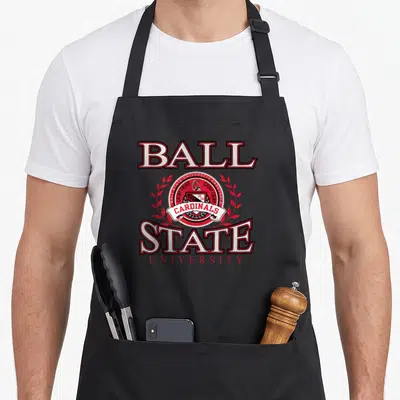 Ball state laurel cardinal apron - Red and white Ball State University logo with bird emblem and laurel leaves on black — shown on a black cotton canvas apron against a white background
