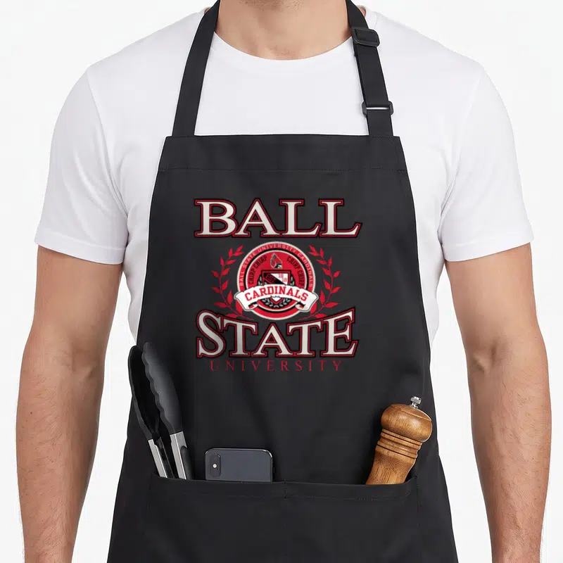 Ball state laurel cardinal apron - Red and white Ball State University logo with bird emblem and laurel leaves on black — shown on a black cotton canvas apron against a white background