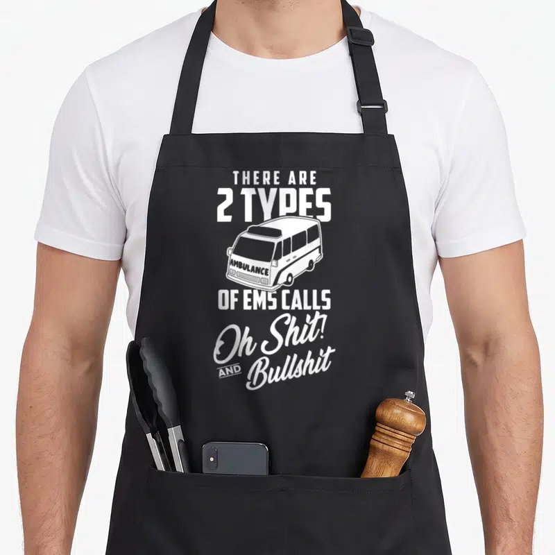 Responder emt apron - White stacked text and ambulance graphic reading 2 types of EMS calls oh shit and bullshit — shown on a black cotton canvas apron against a white background